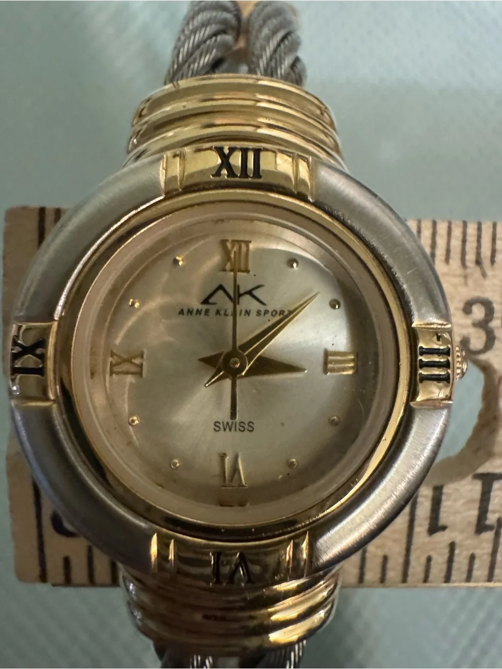 Anne Klein Two-Tone Gold and Silver Cable Bracelet Watch